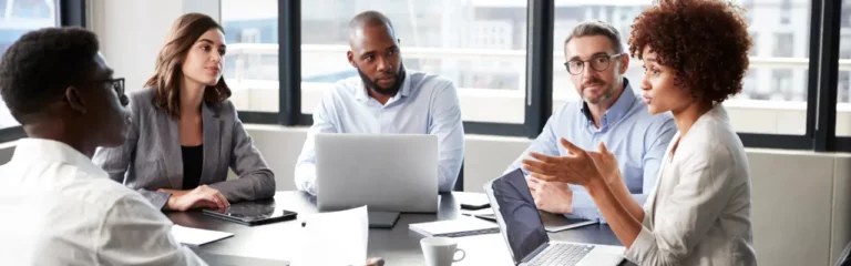 Office scene expressing the commercial awareness course Multi cultural business.